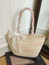 Woven Straw Shoulder Bag with Lace Bow Detail - $386.43 MXN