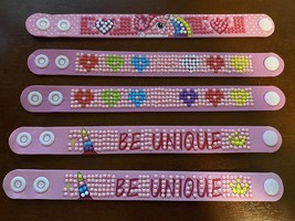 Childrens braclets 3 designs 5 total - $94.77 MXN