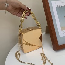 Golden Glamour: Shimmering Gold Handbag Radiant Riches: Gilded Gold Stat... - $35.99