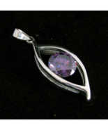 Sterling silver Eye shaped Pendant with a Beautiful round cut Purple CZ ... - $35.00
