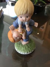 Vintage 1981 Enesco Porcelain Figurine - Boy and Girl Playing Leapfrog - $14.00