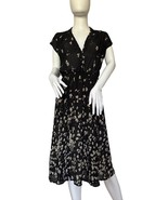 REFORMATION black Flower Sheer Dress size S - $1,121.04 MXN