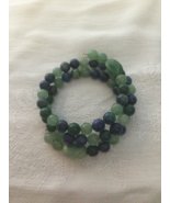 Memory wire bracelet, ear rings and wire wrapped donut pendant - €56,46 EUR