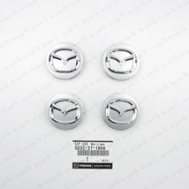 SET OF 4 NEW GENUINE MAZDA CENTER  WHEEL CAP G22C-37-190A - $55.53 CAD