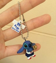 Disney toy figure model from Stitch dressed as Brass Band strap.Music Th... - $12.00