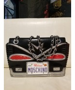 Moschino Jeremy Scott Cadillac Handbag - $45,677.23 MXN