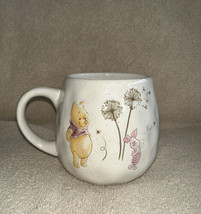 DISNEY Winnie the Pooh & ￼Piglet Blowing Dandelions Ivory Dimpled Cup Mug NEW - $19.90