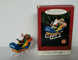 1994 Hallmark Santa&#39;s Lego Sleigh Here Comes Santa With Gift Bag Ornamen... - $14.99