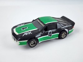 Aurora AFX Black &amp; Green Chevy Camaro  #4 HO Slot Car Nice Body Chassis-... - $46.52