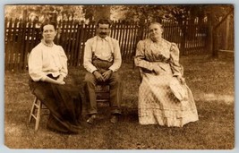 1900s RPPC Real Photo Postcard Of Two Country Ladies And A Man Sitting in Yard - £20.91 GBP
