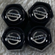 Genuine Nissan Metal Tire Air Stem Valve Covers Set. NEW - $371.68 MXN