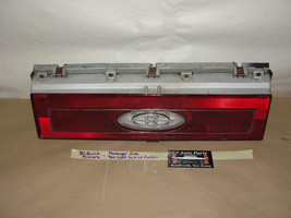 80 Buick Riviera Right Pass Side Brake Reverse Tail Light Lens Bezel W/ Emblem - £69.76 GBP