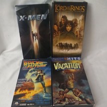 Lot of 4 Vintage VHS Tapes X Men Lord of the Rings,BTTF, Lampoons Vacation  - £20.29 GBP