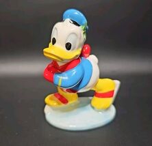 Vintage 1960s Disney Japan Porcelain Donald Duck Ice Skating Figurine 3.5in - $31.73 CAD