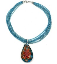 Necklace with Floral Coral Design Clear Resin Pendant with Blue Beads - $256.05 MXN