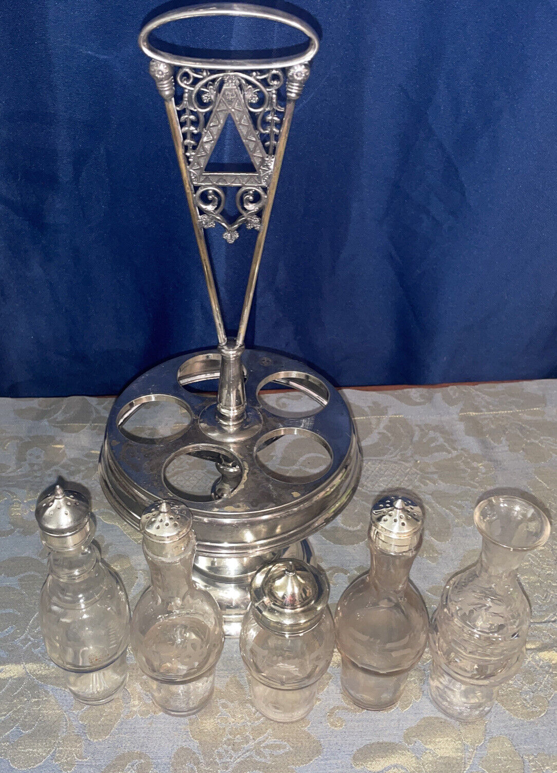 Primary image for Antique Rogers Triple Silver Plate Castor , Cruet Set 5 Jars Etched as is