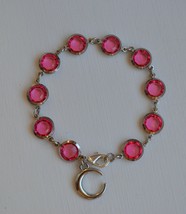 Handmade pink glass bead with moon charm bracelet - $10.50