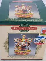 1998 Mr Christmas Peanuts Holiday Go Round Musical Carousel in Box - $74.24