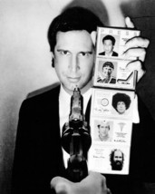 Chevy Chase flashes his ID cards as Fletch 8x10 photo - $9.75