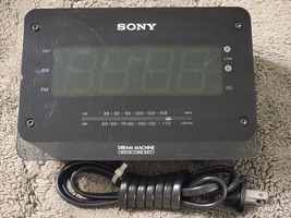 The Sony ICF-C414 am/fm radio;DreamMachine;2009 model. - $16.00