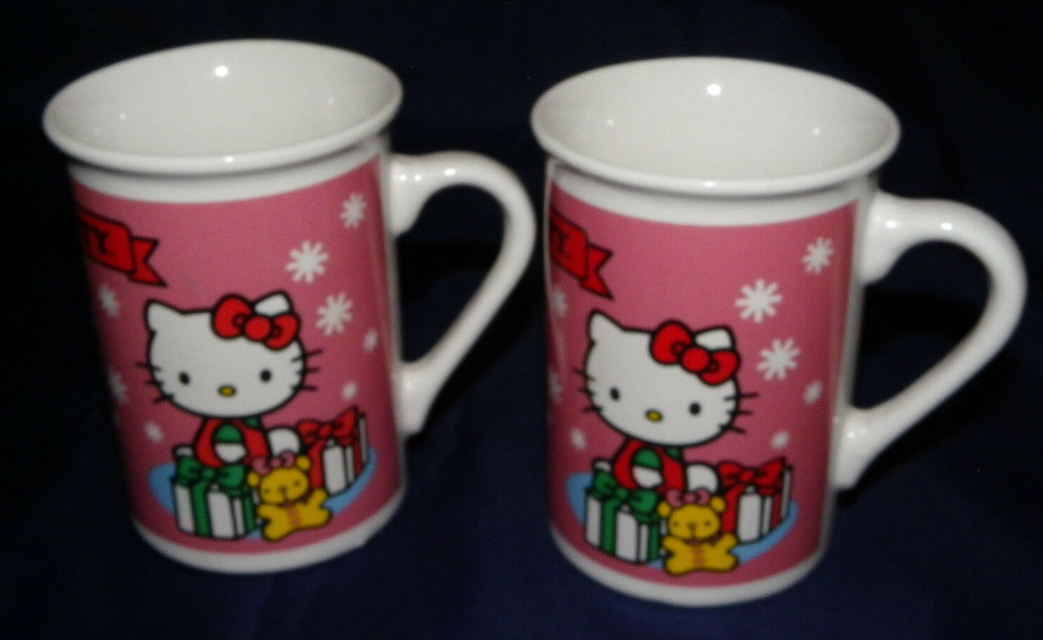 Primary image for Hello Kitty Mug Lot of 2 Sanrio 1976 2013 Hello Kitty Cups Holiday Hello Kitty