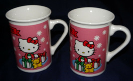 Hello Kitty Mug Lot of 2 Sanrio 1976 2013 Hello Kitty Cups Holiday Hello Kitty - $14.99