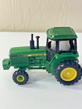Ertl Diecast Farm Toy John Deere Pullback Tractor 1:64 scale  - $9.89