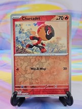 Pokemon TCG Surging Sparks Card | Charcadet Reverse Holo 032/191 Common - $0.99