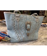 Ladies Montana West real leather purse in baby blue color - $95.00