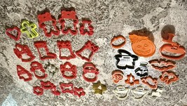 Vintage Lot of 34 Plastic &amp; Metal Holiday Cookie Cutters Christmas Hallo... - $14.85