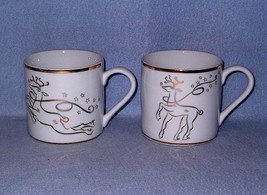 Rudolph Company 2 White and Gold Reindeer Cups Mugs - $9.58 CAD