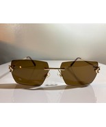 Unisex, rimless, polygonal sunglasses with brown lenses and gold wire fr... - $10.00
