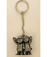 Key Ring Signed Made in Norway with a Girl and Boy Bundled up For Winter - £7.00 GBP