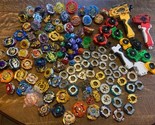 Beyblade lot of Hasbro Various Beyblades + Parts Accessories Pieces, - £233.05 GBP