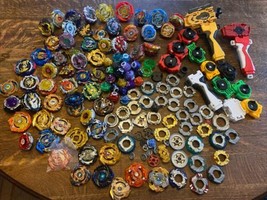 Beyblade lot of Hasbro Various Beyblades + Parts Accessories Pieces, - £233.62 GBP