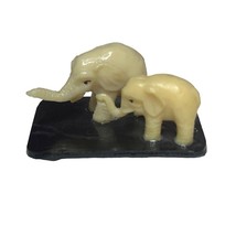 Vintage Celluloid Elephant Figurine 2 Elephants on Black Stand Trunks Up - $278.12 MXN