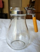 Dripcut Made in USA Glass Syrup Jar Orange Bakelite Handle Honey Dispens... - $15.57