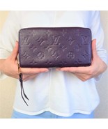 Louis Vuitton Monogram Empreinte Leather Aube/Violet Secret Wallet - $399.00