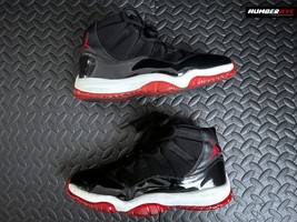 Authenticity Guarantee 
Air Jordan 11 Retro Bred Black Red 136046-061 Vintage... - $296.99