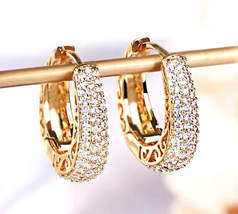 Golden hoops with zircon inlays / Argollas doradas con incrustaciones de... - €10,33 EUR