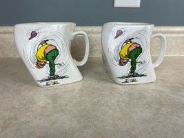  2 Golf Gifts Inc. 1991 Designer 12 Fluid The Results Of Over Swing Coffee Mugs  - £6.77 GBP