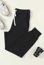 Black Drawstring Elastic Waistband Pocketed Joggers - $241.02 MXN