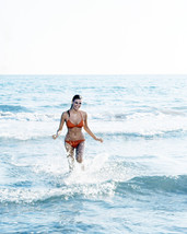 Raquel Welch 16x20 Poster sexy in bikini in surf - £15.67 GBP