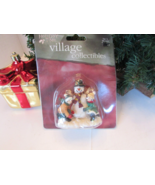 Holiday Time Walmart Village Figurine Building a Snowman L135 - $4.70