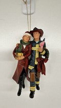 2002 Heroes Christmas Tree Ornament Firefighter Woman In Red Coat - $19.75