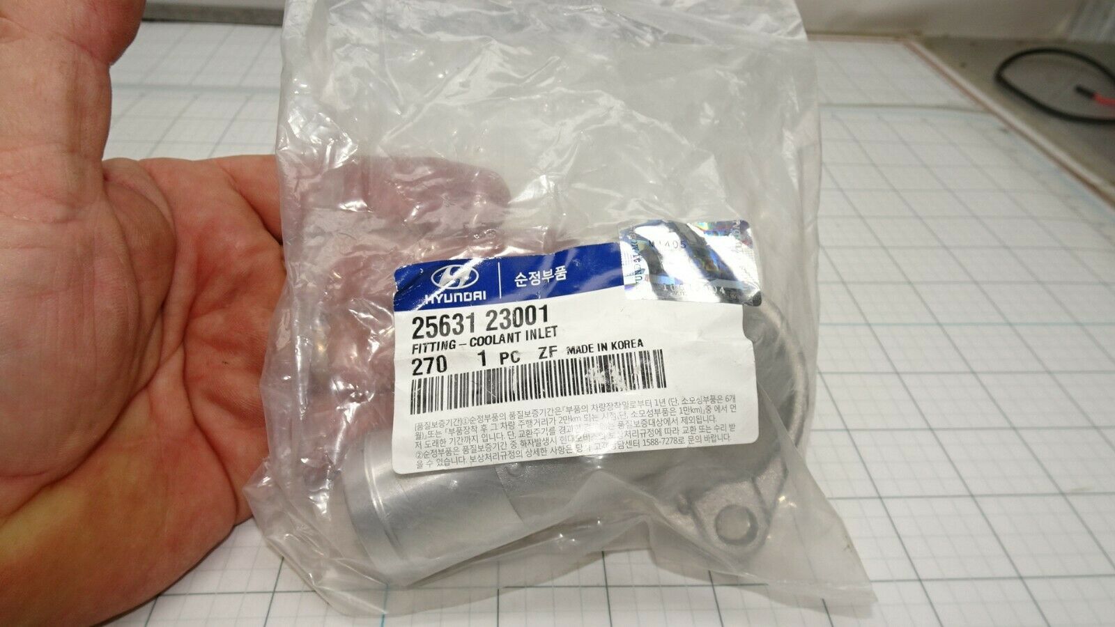 Primary image for Hyundai Kia 25631 23001 Coolant Inlet Thermostat Housing Factory Sealed OEM NOS