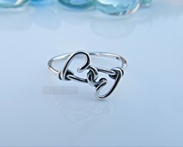 Sterling Silver Heart Knot Ring: Sweet Promise Ring - $323.88 MXN