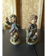 pair of Hummel style 7.5&quot; figurines - $41.38