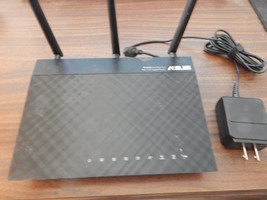 Asus RT-AC66U Dual Band 3x3 802.11ac Wireless Router 4 Port 10/100/1000 ... - £35.01 GBP