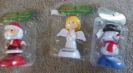 3 pieces christmas /holiday Dancer Sunny Jiggler new in package santa sn... - £4.67 GBP